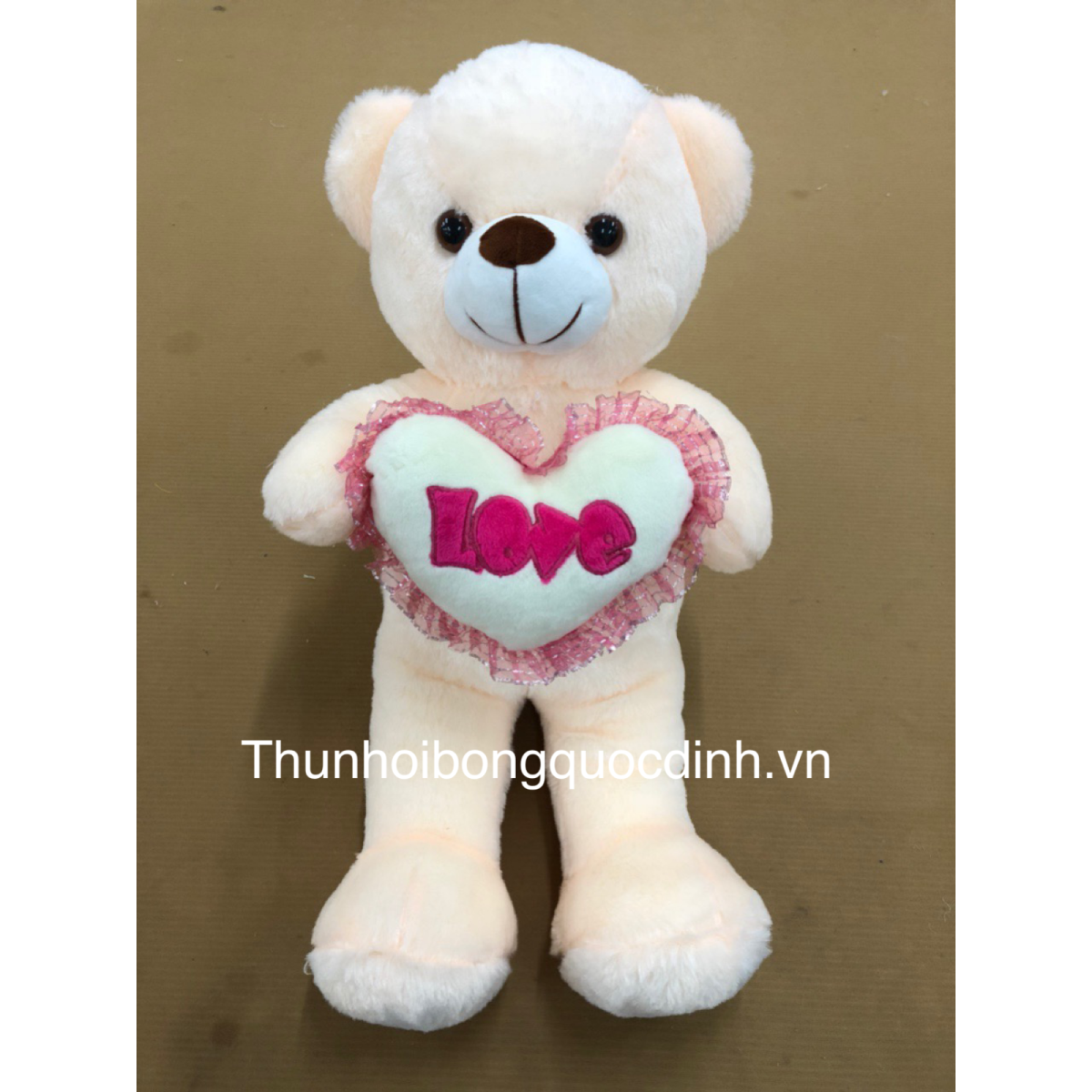 Gấu duổi ôm tim